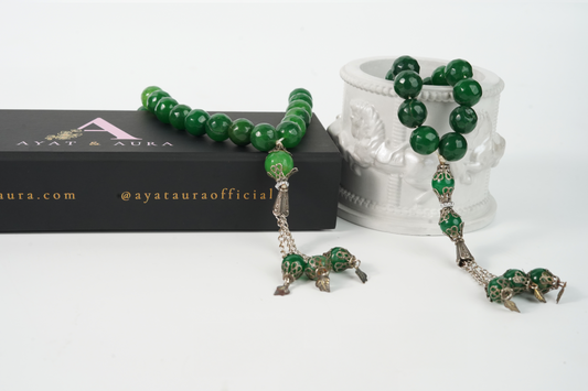 Agate green beaded Tasbih set with silver accents on a white background, featuring the Ayata Aura brand.