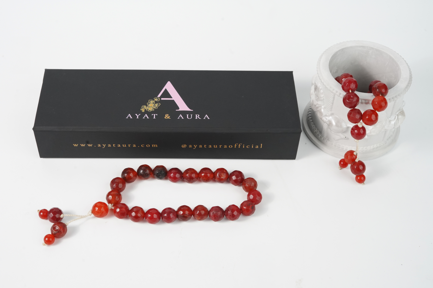 Close-up of 10 mm agate beads and ivory cord