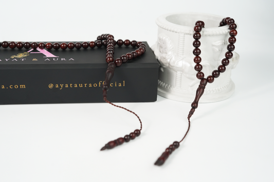 99-bead cocoa-tone wooden tasbih on its premium gift box, long loop shown