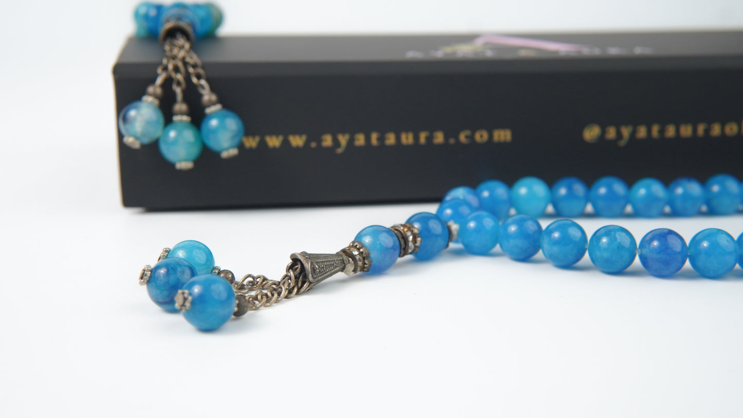 Close-up of 6 mm agate beads and tassel accents