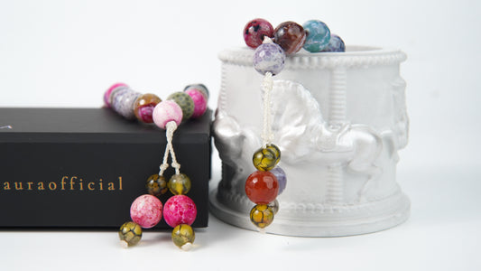 Close detail of crackle agate beads and ivory braided cord