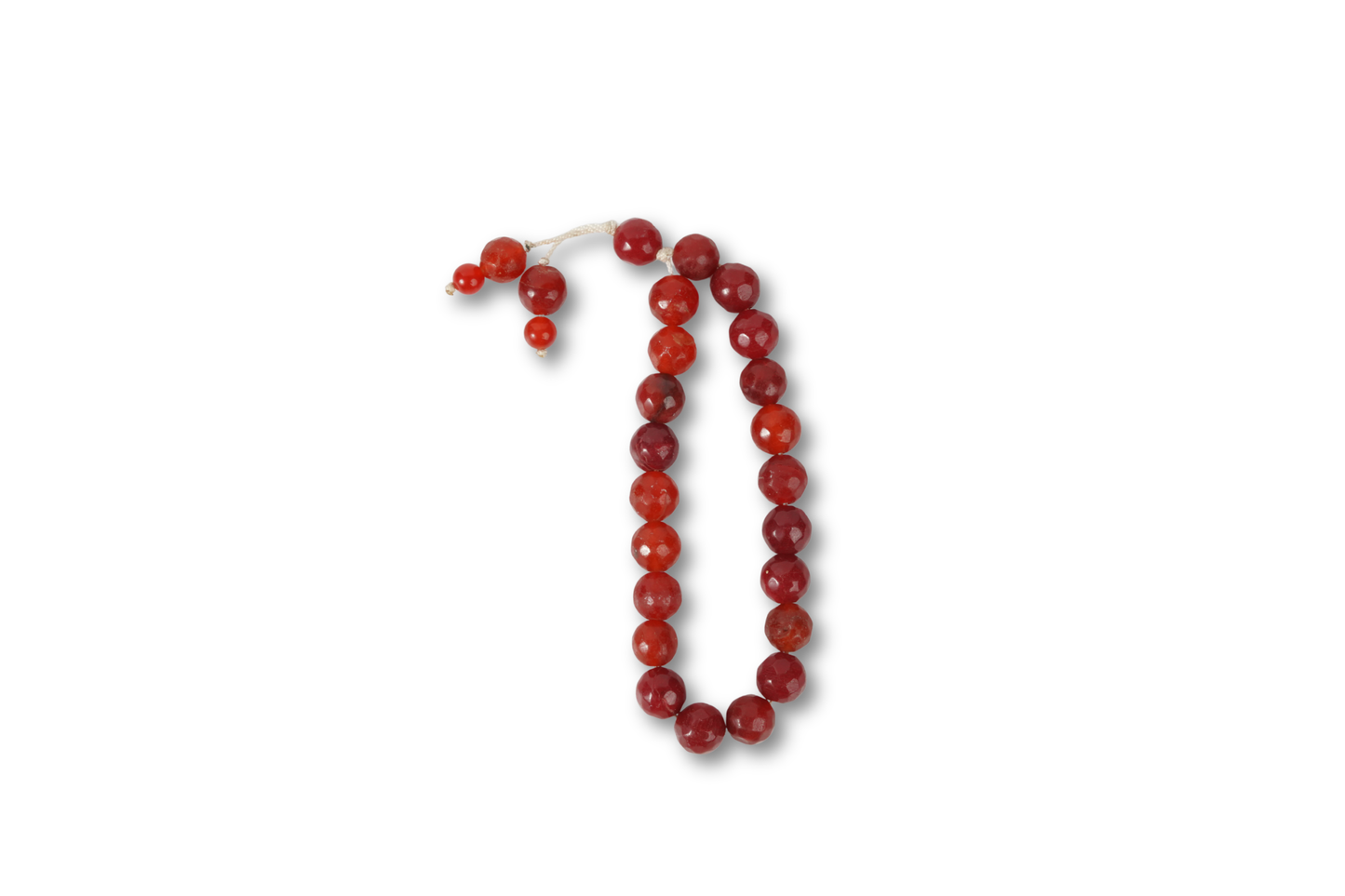 Antique-red agate tasbih on white background