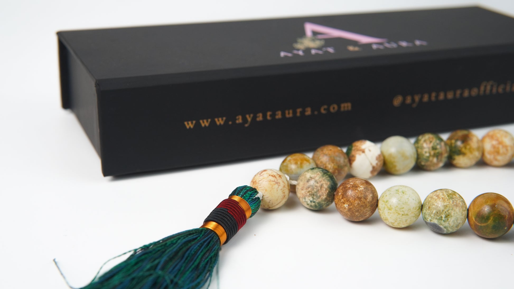 Close-up of marbled agate beads and tassel