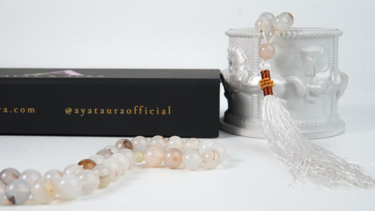 Close-up of agate beads and white tassel