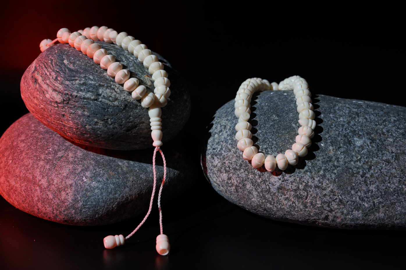 Camel bone prayer beads styled on stones with mist